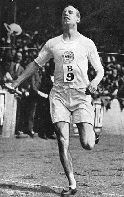 Eric Liddell at the Paris Olympics, 1924. He won gold and set a world’s record in the 400 meters, then grabbed a bronze in the 200, but his best event was the 100 meter dash. When his preliminary heat was scheduled for a Sunday, he refused to run because he considered it the Sabbath, a principled stand immortalized in the film “Chariots of Fire.” But his return to China and service to fellow prisoners of war are why we celebrate him as a saint; he was interned by the Japanese in 1943 and later given a chance to participate in a prisoner exchange with the British, but he gave up his place to a pregnant woman instead.