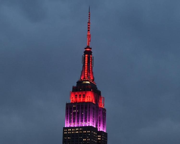 Bring Back Our Girls, 1 Year Later: The Empire State Building in New York, bathed in red and purple to remember the kidnap victims of Boko Haram. (Timothy A. Cleary/Agence France-Presse)