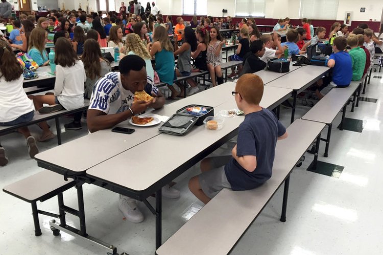Members of the Florida State University American-football team traveled to a local middle school in Tallahassee this week as a goodwill gesture, but something happened that made the visit more than routine. One of the players noticed a boy in the lunchroom sitting by himself, and asked if he could sit with him. The boy looked up and said, “Sure, why not?” He didn’t know that the tall athlete standing there was Travis Rudolph, one of the stars on the highly regarded team, and the athlete didn’t know that the kid was named Bo Paske, who is diagnosed on the autism spectrum. But they soon found out, and so did the rest of the world, when Bo’s mother was moved to tears by the big man’s kindness and posted her thanks on Facebook. Bo has friends and sometimes eats with them, but other times he sits by himself. (Michael Halligan)