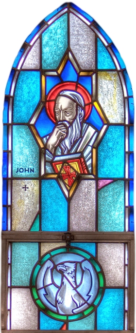 St. John looking contemplative, in a window at St. Paul’s, Kankakee, Illinois. (parish website)